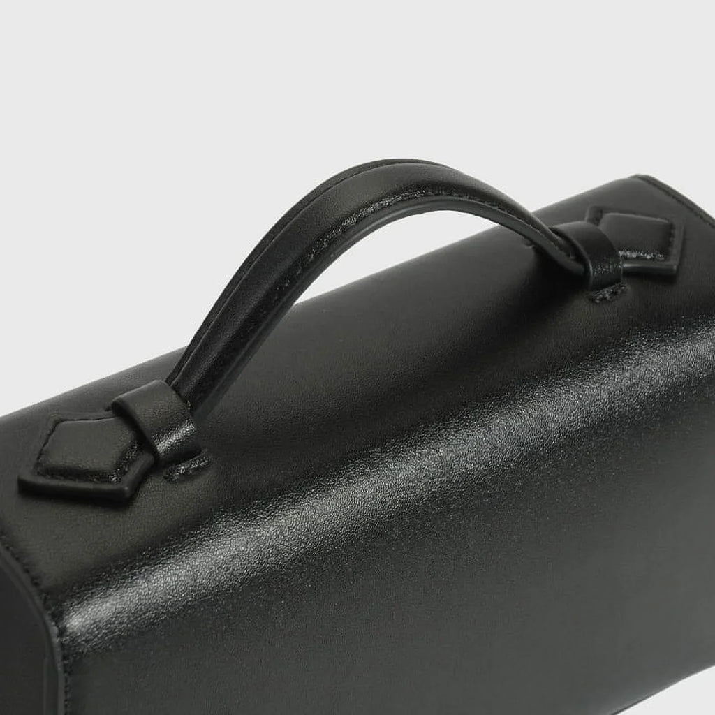 Qi Partner Handbags for Women The Symmetry Leather Top Handle Pochette Bags in ebony