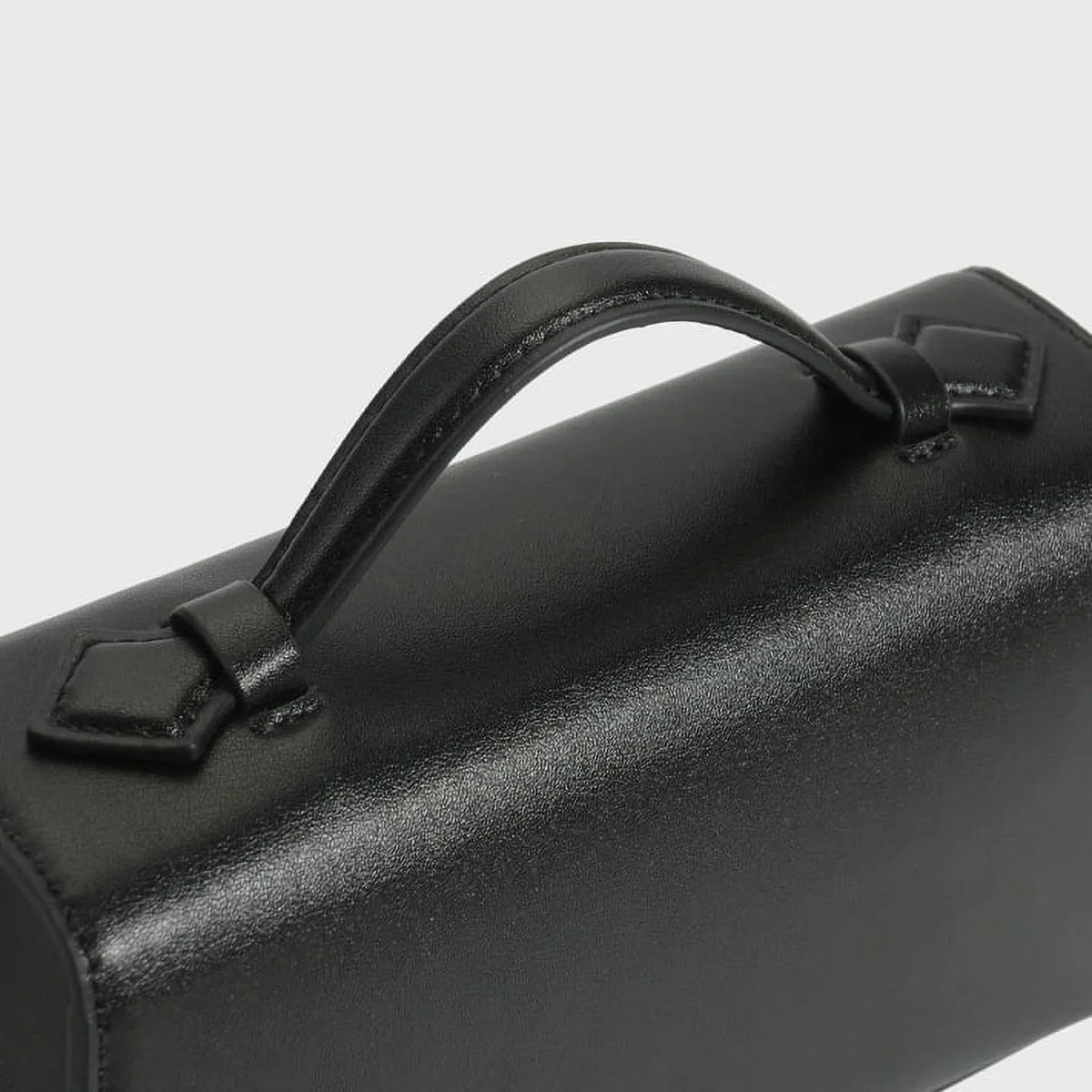 Qi Partner Handbags for Women The Symmetry Leather Top Handle Pochette Bags in ebony